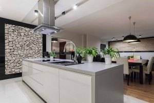 Picture of designed kitchen with stone wall